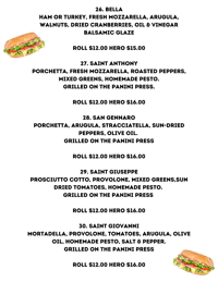 two hot dogs on a black background